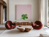 Succulent Simplicity VII on Pink by Felicity Bradley. Shown as extra-large giant wall art in a modern living room. Available as an archival giclee rolled canvas, fine art paper, or poster print. SKU 34351a.