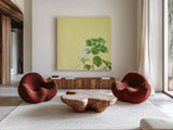Succulent Simplicity X by Felicity Bradley. Shown as extra-large giant wall art in a modern living room. Available as an archival giclee rolled canvas, fine art paper, or poster print. SKU 33843a.