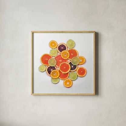 Sunny Citrus I Crop by Felicity Bradley. Shown in a natural wood glass frame for a timeless modern aesthetic. Available as an archival giclee rolled canvas, fine art paper, or poster print. SKU 45709a.