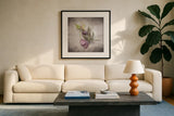 Vintage Hellebore Study VII by Felicity Bradley. Displayed in a glass frame with matte in a clean modern living room. Available as an archival giclee rolled canvas, fine art paper, or poster print. SKU 36954a.