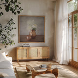 Vintage Peony Dreams III by Felicity Bradley. Shown in a natural wood frame in a cozy modern living room. Available as an archival giclee rolled canvas, fine art paper, or poster print. SKU 36957a.