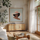 Beach Girl I by Gia Graham. Shown in a natural wood frame in a cozy modern living room. Available as an archival giclee rolled canvas, fine art paper, or poster print. SKU 99718a.