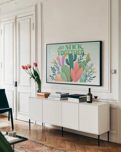 Cactus Garden I by Gia Graham. shown as a framed stretched canvas in a living room above a console. Available as a archival giclee rolled canvas, fine art paper, or poster print. SKU 87267i.