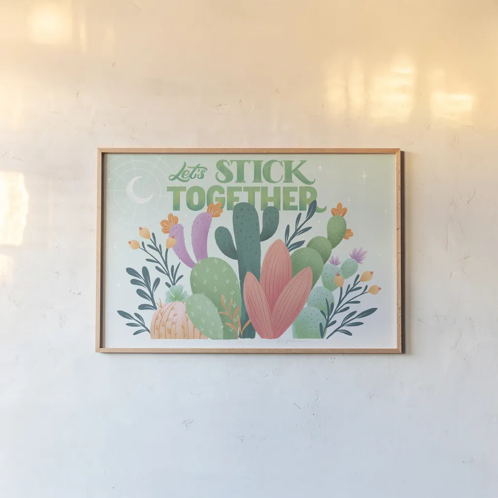 Cactus Garden I by Gia Graham. shown as a paper print in a natural frame. Available as a archival giclee rolled canvas, fine art paper, or poster print. SKU 87267i.