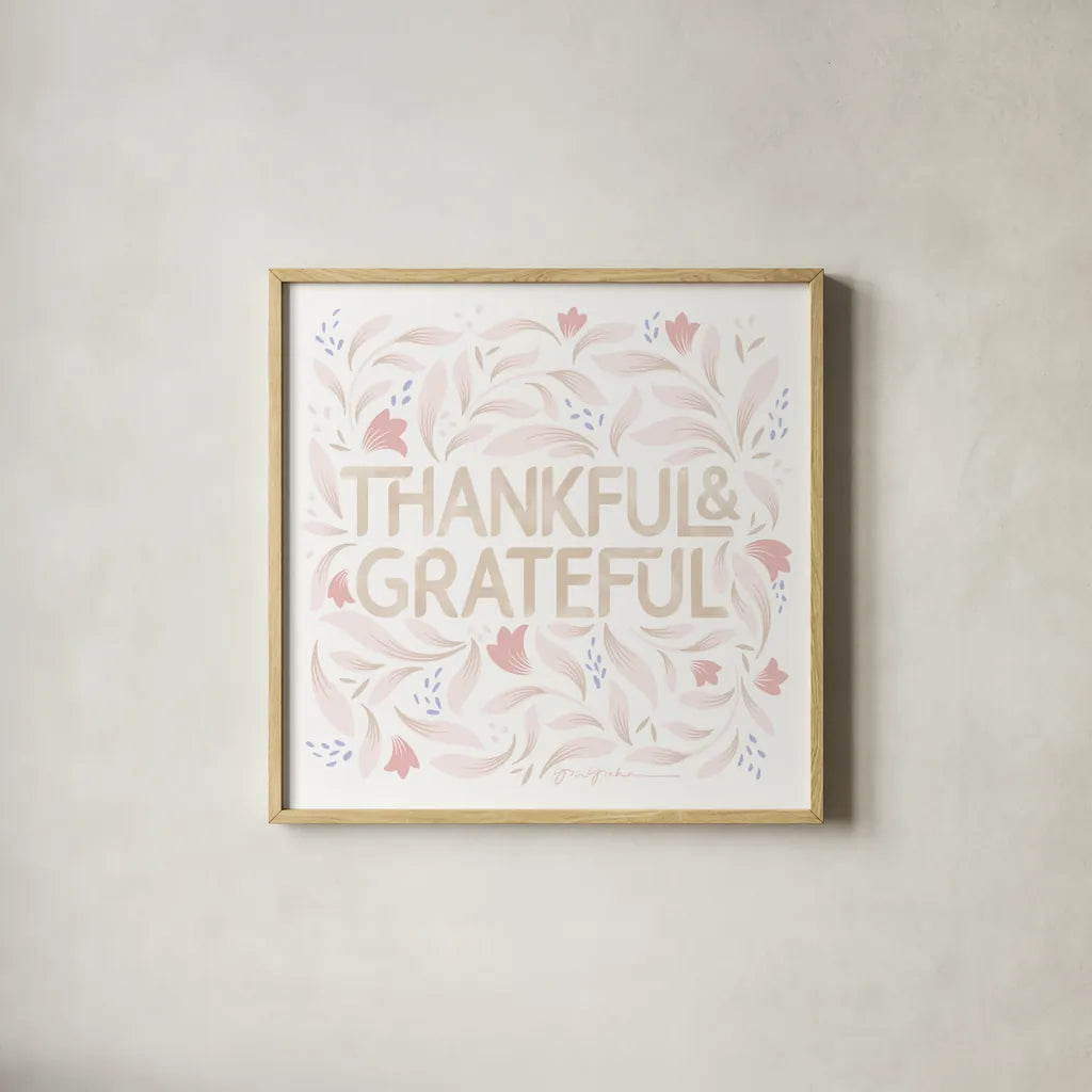 Calm Words I Thankful Blush by Gia Graham. Shown in a natural wood glass frame for a timeless modern aesthetic. Available as an archival giclee rolled canvas, fine art paper, or poster print. SKU 72735a.