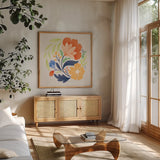 Floral Study I Bright by Gia Graham. Shown in a natural wood frame in a cozy modern living room. Available as an archival giclee rolled canvas, fine art paper, or poster print. SKU 79544a.