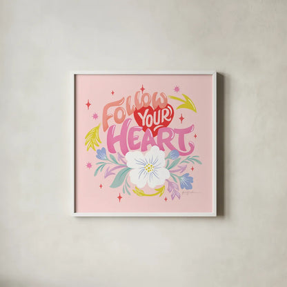 Follow Your Heart I Sq by Gia Graham. Shown in a crisp white glass frame for a clean and minimalist style. Available as an archival giclee rolled canvas, fine art paper, or poster print. SKU 75071a.