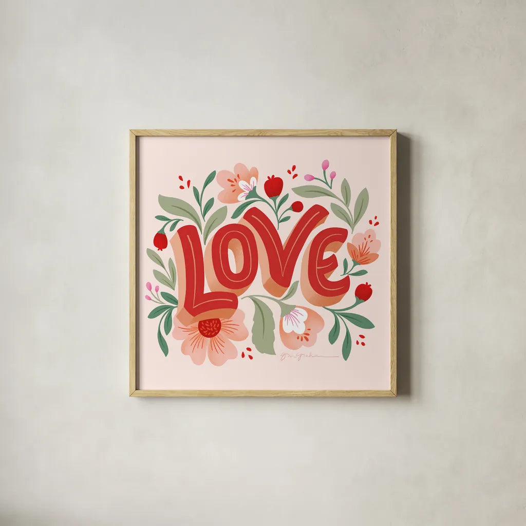 Love I Pink by Gia Graham. Shown in a natural wood glass frame for a timeless modern aesthetic. Available as an archival giclee rolled canvas, fine art paper, or poster print. SKU 85008a.