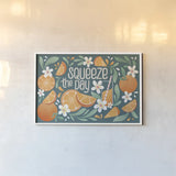 Orange Zest I by Gia Graham. shown as a paper print in a white frame. Available as a archival giclee rolled canvas, fine art paper, or poster print. SKU 88932i.