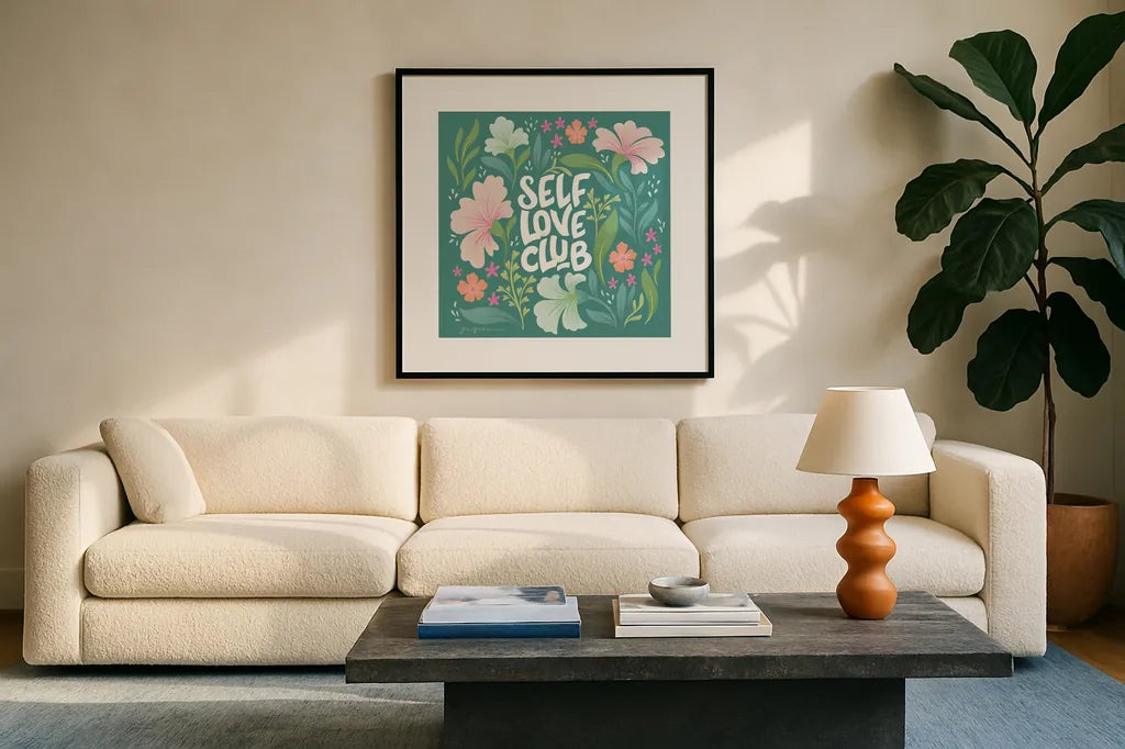 Self Love Club I by Gia Graham. Displayed in a glass frame with matte in a clean modern living room. Available as an archival giclee rolled canvas, fine art paper, or poster print. SKU 72656a.