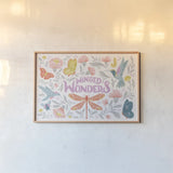 Winged Wonders I by Gia Graham. shown as a paper print in a natural frame. Available as a archival giclee rolled canvas, fine art paper, or poster print. SKU 85037i.