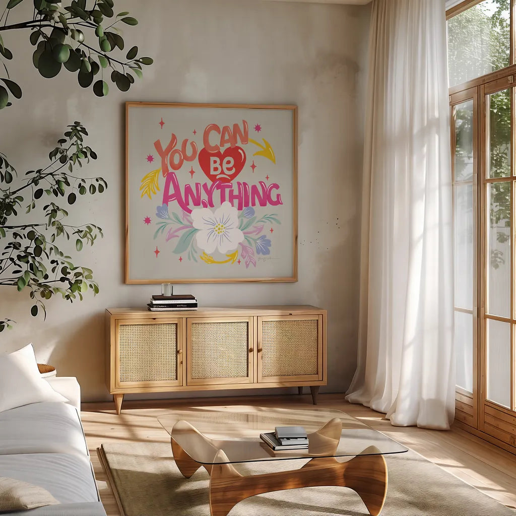 You Can Be Anything by Gia Graham. Shown in a natural wood frame in a cozy modern living room. Available as an archival giclee rolled canvas, fine art paper, or poster print. SKU 87812a.