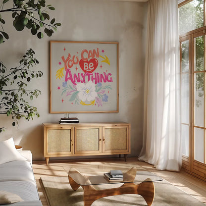 You Can Be Anything by Gia Graham. Shown in a natural wood frame in a cozy modern living room. Available as an archival giclee rolled canvas, fine art paper, or poster print. SKU 87812a.