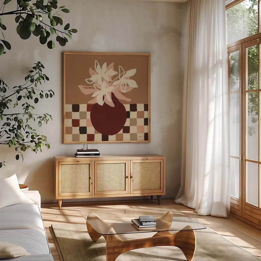 Calico Lilies by Haley Knighten. Shown in a natural wood frame in a cozy modern living room. Available as an archival giclee rolled canvas, fine art paper, or poster print. SKU 95367a.