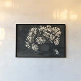 Moody Baby by Haley Knighten. shown as a paper print in a black flame. Available as a archival giclee rolled canvas, fine art paper, or poster print. SKU 90304i.