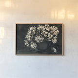 Moody Baby by Haley Knighten. shown as a paper print in a natural frame. Available as a archival giclee rolled canvas, fine art paper, or poster print. SKU 90304i.