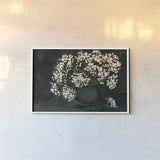 Moody Baby by Haley Knighten. shown as a paper print in a white frame. Available as a archival giclee rolled canvas, fine art paper, or poster print. SKU 90304i.