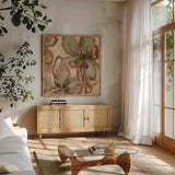 Petal Play II by Haley Knighten. Shown in a natural wood frame in a cozy modern living room. Available as an archival giclee rolled canvas, fine art paper, or poster print. SKU 93302a.
