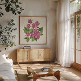 Tropical Fun Flowers IV with Gold by Harriet Sussman. Shown in a natural wood frame in a cozy modern living room. Available as an archival giclee rolled canvas, fine art paper, or poster print. SKU 30978a.