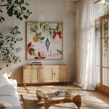 Watercolor Christmas II by Harriet Sussman. Shown in a natural wood frame in a cozy modern living room. Available as an archival giclee rolled canvas, fine art paper, or poster print. SKU 30811a.