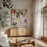 Watercolor Christmas IV by Harriet Sussman. Shown in a natural wood frame in a cozy modern living room. Available as an archival giclee rolled canvas, fine art paper, or poster print. SKU 30813a.