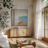 Blue Breeze II by James Wiens. Shown in a natural wood frame in a cozy modern living room. Available as an archival giclee rolled canvas, fine art paper, or poster print. SKU 14065a.