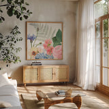 Boho Bouquet  IX by James Wiens. Shown in a natural wood frame in a cozy modern living room. Available as an archival giclee rolled canvas, fine art paper, or poster print. SKU 68449a.