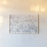 Bringing in Blossoms by James Wiens. shown as a paper print in a white frame. Available as a archival giclee rolled canvas, fine art paper, or poster print. SKU 43507i.