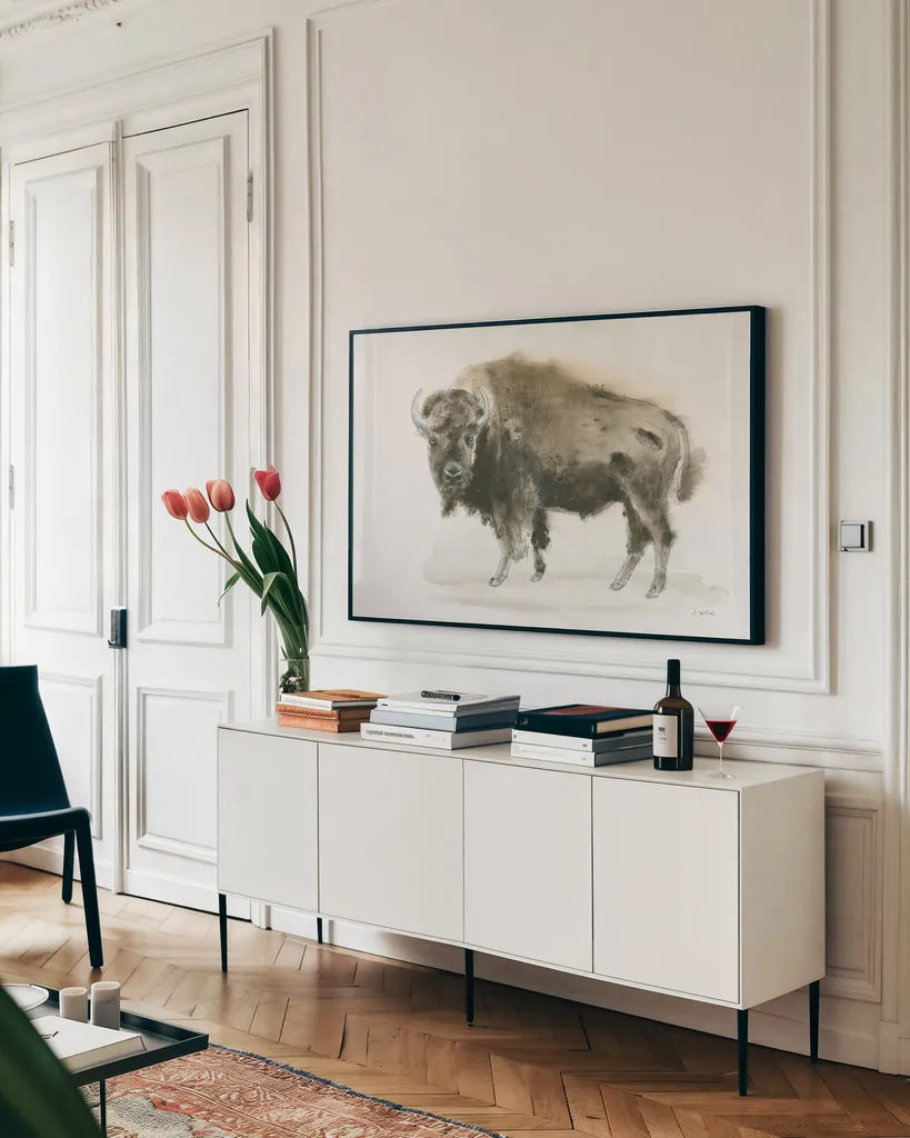 Buffalo Bill by James Wiens. shown as a framed stretched canvas in a living room above a console. Available as a archival giclee rolled canvas, fine art paper, or poster print. SKU 23621i.