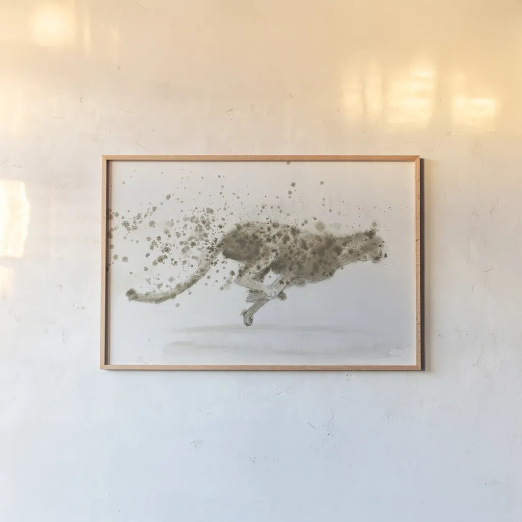 Cheetah v.2 by James Wiens. shown as a paper print in a natural frame. Available as a archival giclee rolled canvas, fine art paper, or poster print. SKU 22186i.