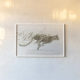 Cheetah v.2 by James Wiens. shown as a paper print in a white frame. Available as a archival giclee rolled canvas, fine art paper, or poster print. SKU 22186i.