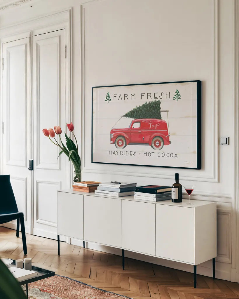 Christmas Farm VI by James Wiens. shown as a framed stretched canvas in a living room above a console. Available as a archival giclee rolled canvas, fine art paper, or poster print. SKU 71008i.