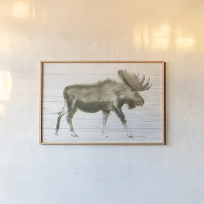 Dark Moose on Wood Crop by James Wiens. shown as a paper print in a natural frame. Available as a archival giclee rolled canvas, fine art paper, or poster print. SKU 38831i.