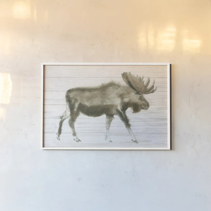 Dark Moose on Wood Crop by James Wiens. shown as a paper print in a white frame. Available as a archival giclee rolled canvas, fine art paper, or poster print. SKU 38831i.