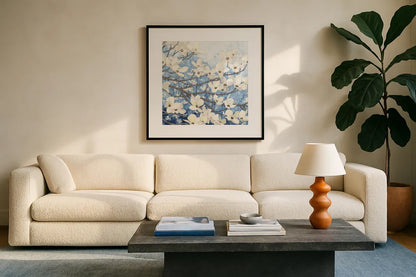 Dogwood Blossoms II Indigo by James Wiens. Displayed in a glass frame with matte in a clean modern living room. Available as an archival giclee rolled canvas, fine art paper, or poster print. SKU 23973a.
