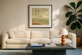 Golden Birch I with Blue Sky by James Wiens. Displayed in a glass frame with matte in a clean modern living room. Available as an archival giclee rolled canvas, fine art paper, or poster print. SKU 10341a.