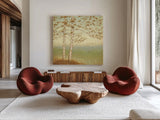 Golden Birch I with Blue Sky by James Wiens. Shown as extra-large giant wall art in a modern living room. Available as an archival giclee rolled canvas, fine art paper, or poster print. SKU 10341a.