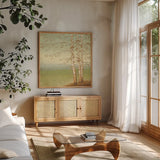 Golden Birch II with Blue Sky by James Wiens. Shown in a natural wood frame in a cozy modern living room. Available as an archival giclee rolled canvas, fine art paper, or poster print. SKU 10342a.