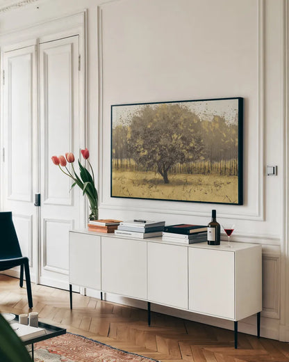 Golden Trees I Taupe by James Wiens. shown as a framed stretched canvas in a living room above a console. Available as a archival giclee rolled canvas, fine art paper, or poster print. SKU 18644i.