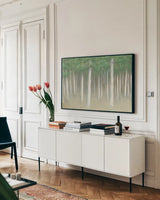 Green Forest Hues I by James Wiens. shown as a framed stretched canvas in a living room above a console. Available as a archival giclee rolled canvas, fine art paper, or poster print. SKU 75173i.
