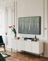 Green Forest Hues II by James Wiens. shown as a framed stretched canvas in a living room above a console. Available as a archival giclee rolled canvas, fine art paper, or poster print. SKU 75174i.