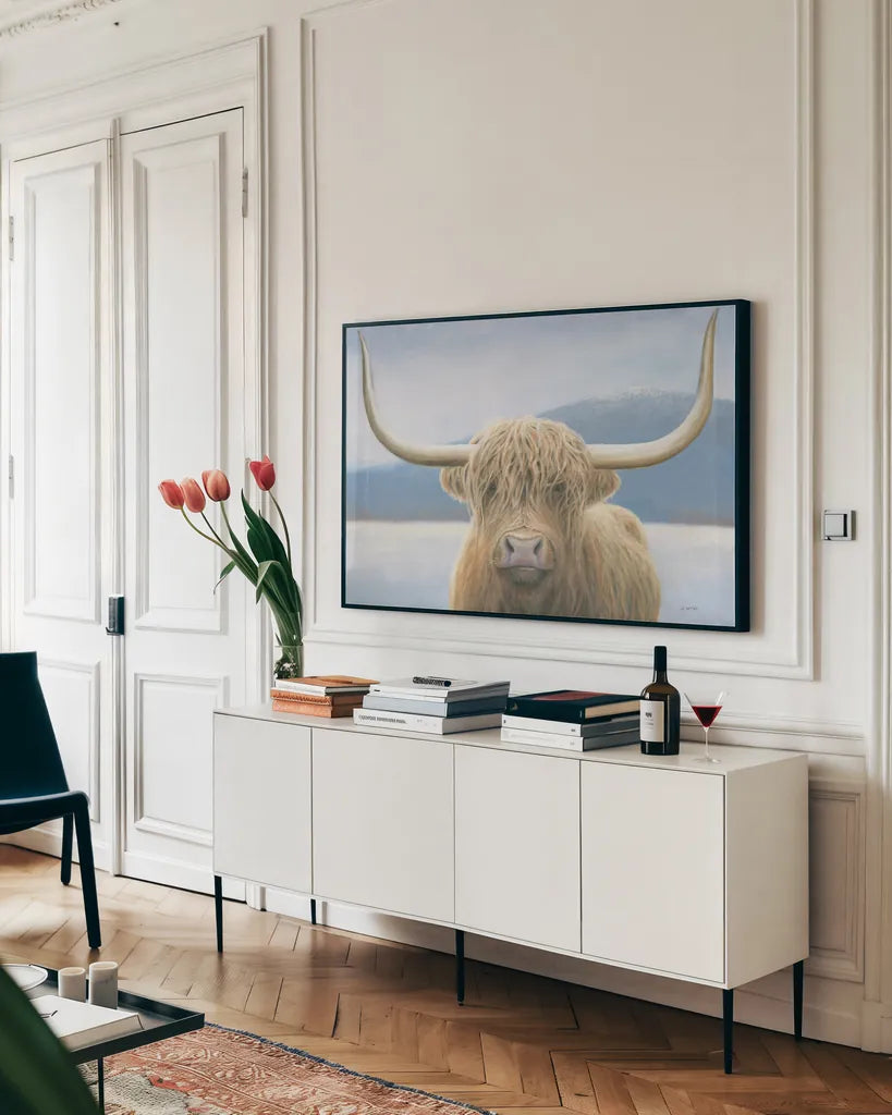 Highland Cow by James Wiens. shown as a framed stretched canvas in a living room above a console. Available as a archival giclee rolled canvas, fine art paper, or poster print. SKU 50229i.