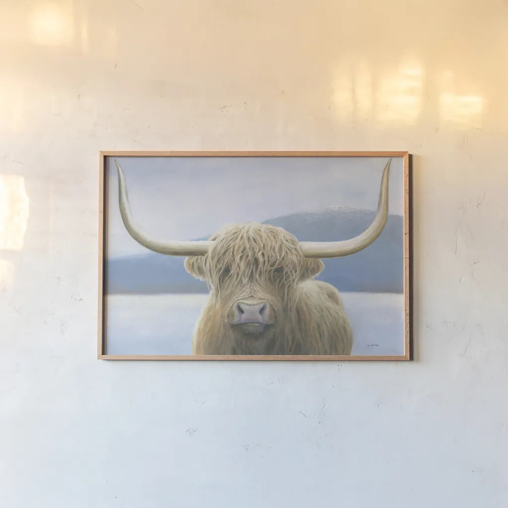 Highland Cow by James Wiens. shown as a paper print in a natural frame. Available as a archival giclee rolled canvas, fine art paper, or poster print. SKU 50229i.