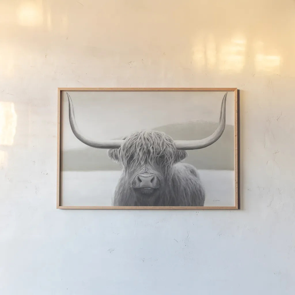 Highland Cow Neutral by James Wiens. shown as a paper print in a natural frame. Available as a archival giclee rolled canvas, fine art paper, or poster print. SKU 51630i.