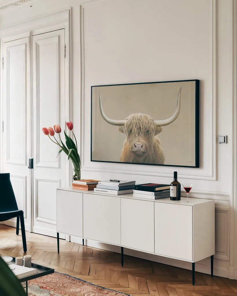Highland Cow Neutral by James Wiens. shown as a framed stretched canvas in a living room above a console. Available as a archival giclee rolled canvas, fine art paper, or poster print. SKU 73113i.
