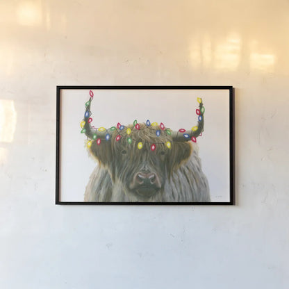 Holiday Highlander by James Wiens. shown as a paper print in a black flame. Available as a archival giclee rolled canvas, fine art paper, or poster print. SKU 56448i.