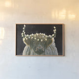 Holiday Highlander BW by James Wiens. shown as a paper print in a natural frame. Available as a archival giclee rolled canvas, fine art paper, or poster print. SKU 81956i.