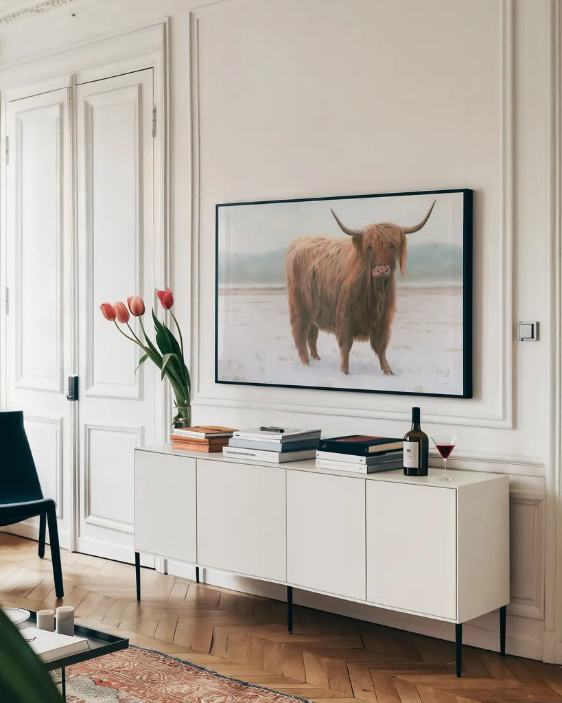 King of the Highland Fields by James Wiens. shown as a framed stretched canvas in a living room above a console. Available as a archival giclee rolled canvas, fine art paper, or poster print. SKU 56445i.