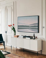 Lakeside Morning by James Wiens. shown as a framed stretched canvas in a living room above a console. Available as a archival giclee rolled canvas, fine art paper, or poster print. SKU 57271i.