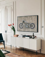 Lets Roll II Gray by James Wiens. shown as a framed stretched canvas in a living room above a console. Available as a archival giclee rolled canvas, fine art paper, or poster print. SKU 53384i.